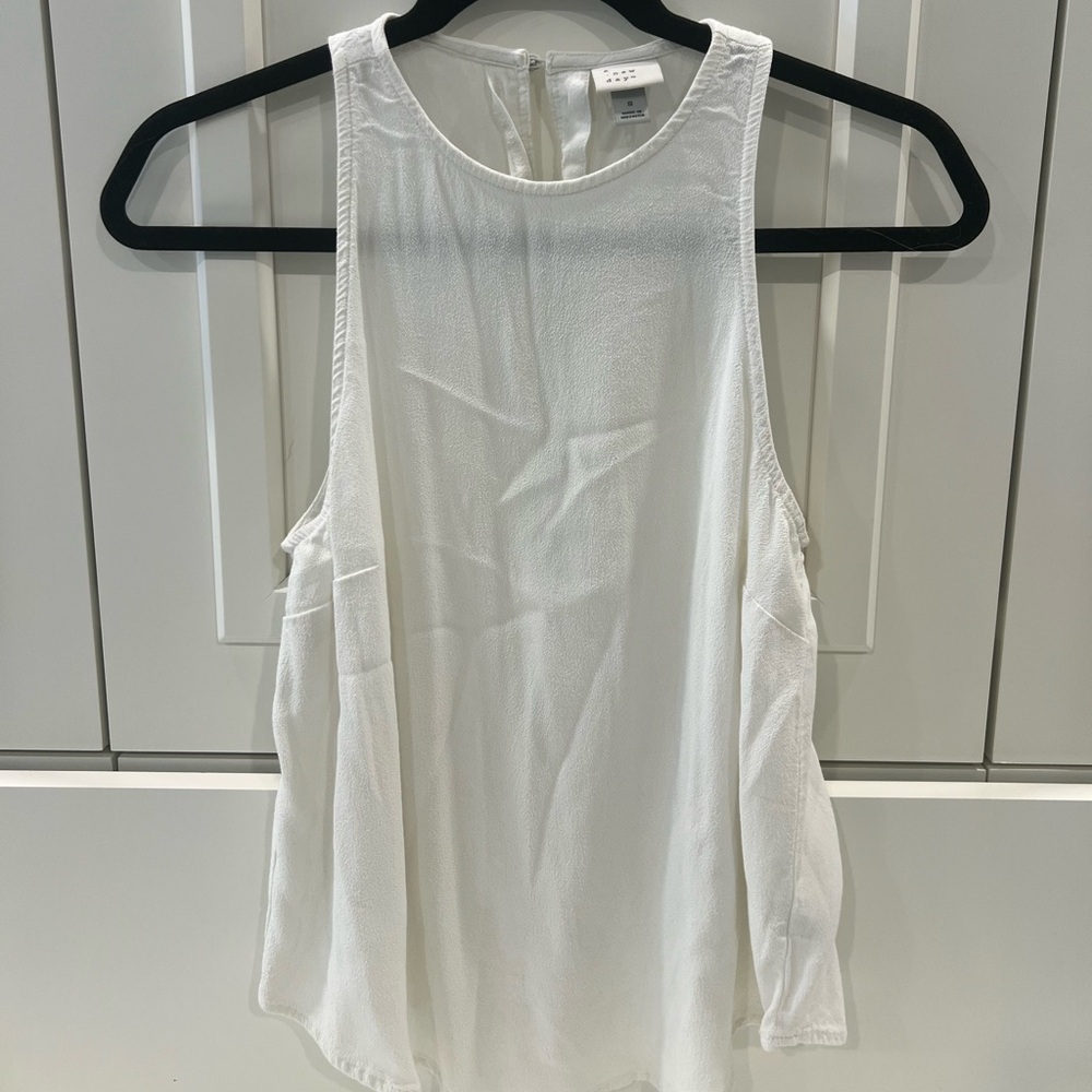 a new day White Tank Top